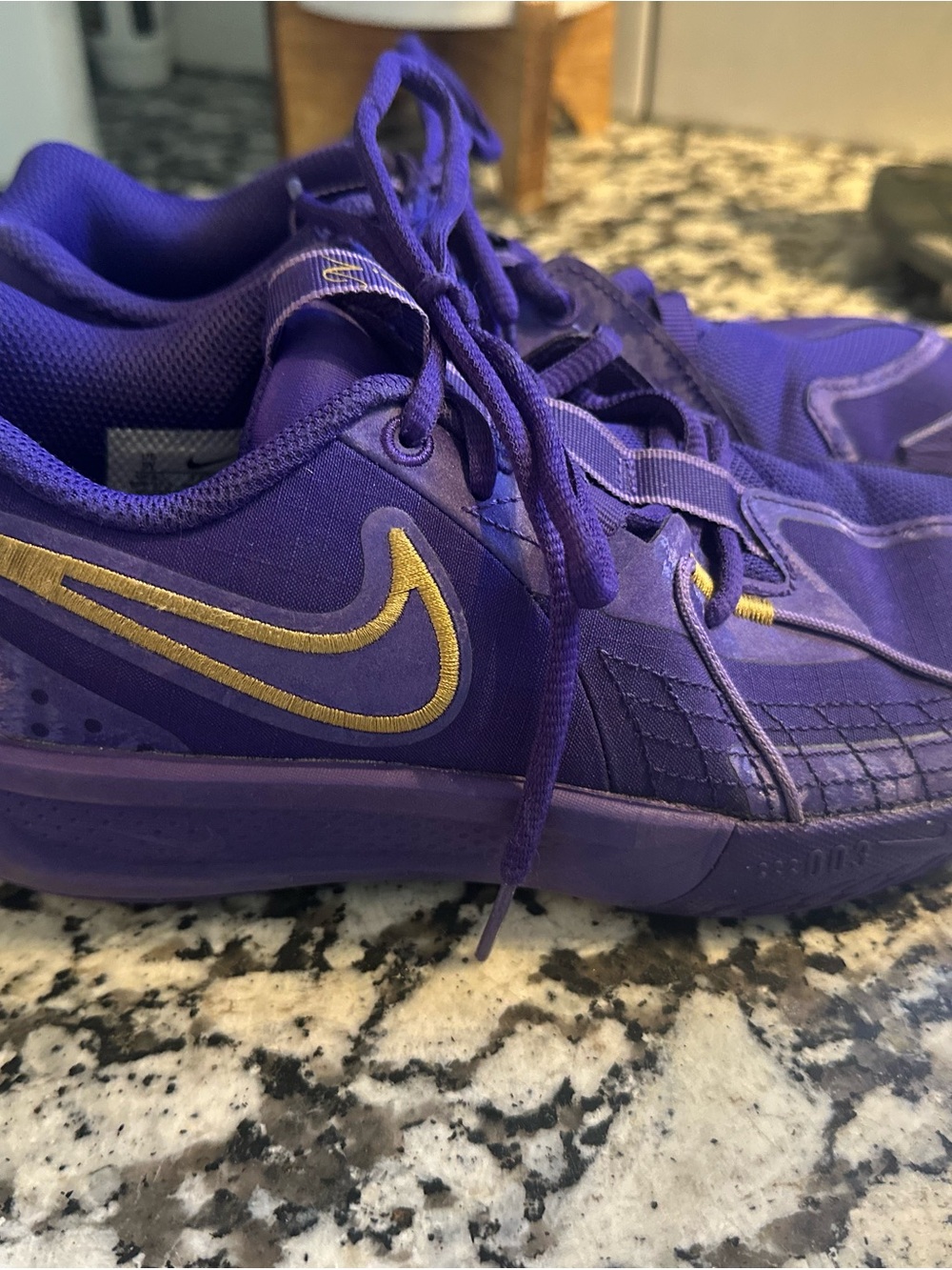 Nike Kids Purple Sneakers with Gold Swoosh